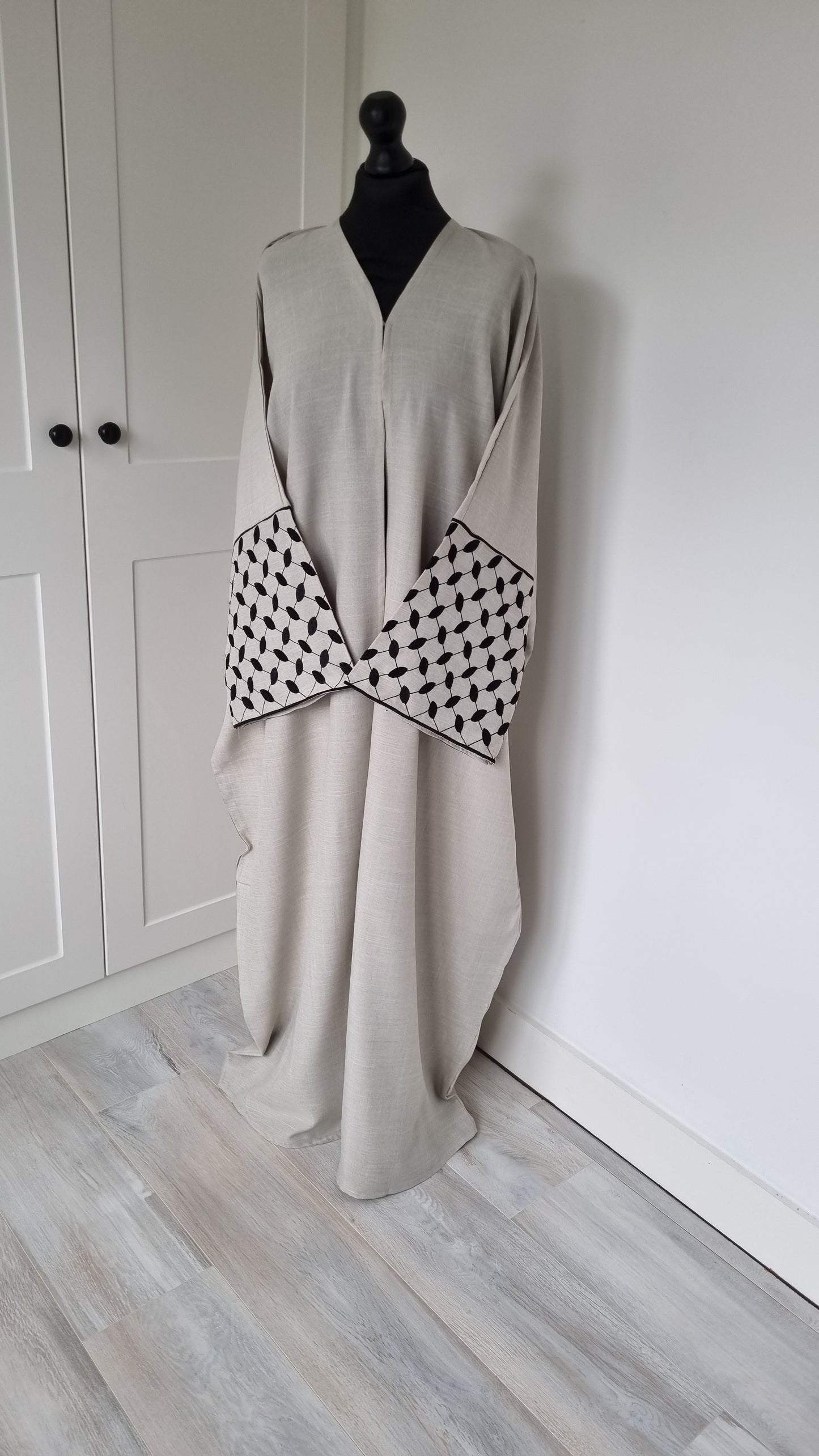 Beige keffiyeh sleeve